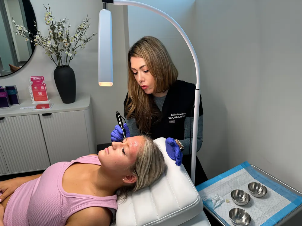 Registered nurse performing microneedling on a patient in a Scottsdale treatment room